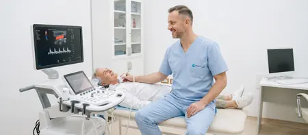 Carotid Doppler, ultrasound probe on the patient's neck during a scan at Medical Time hospital in Belgrade
